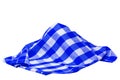 Closeup of a blue and white checkered napkin or tablecloth texture isolated on white background. Kitchen accessories. Top view Royalty Free Stock Photo