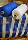 Closeup of Blue and white striped warp with two cotton yarns used in warp. Weaving. Handweaving. Textiles. Fiber. Royalty Free Stock Photo