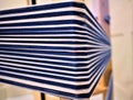 Closeup of Blue and white striped warp. Weaving. Handweaving. Textiles. Fiber.