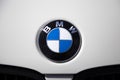 Closeup of BMW brand logo. Chrome car emblem sign on the white car hood. Tuning Show, Tomsk, Russia 2019-06-15 Royalty Free Stock Photo