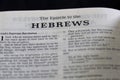 Closeup of the Book of Hebrews from Bible, with focus on the Title of religious text.