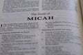 Closeup of the Book of Micah from Bible or Torah, with focus on the Title of Christian and Jewish religious text. Royalty Free Stock Photo