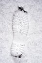 boot footstep in the snow Royalty Free Stock Photo
