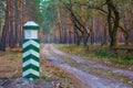 border post in autumn forest Royalty Free Stock Photo
