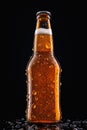 A closeup of a bottle of beer with deep droplets on it. The cine Royalty Free Stock Photo