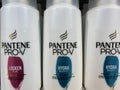 Closeup of bottles Pantene Pro-V shampoo in shelf of german supermarket