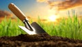 Soil with a Garden Trowel and Green Grass on Background - Generative Ai Royalty Free Stock Photo