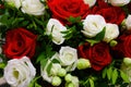 Closeup of bouquet of red white roses in a garden Royalty Free Stock Photo