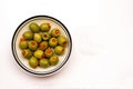 Closeup of a Bowl of Green Stuffed Olives Royalty Free Stock Photo