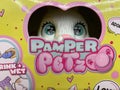 Closeup of box with pamper petz puppet toy in shelf of german supermarket Royalty Free Stock Photo