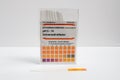Closeup of a box of pH indicator test strips on a white background. Royalty Free Stock Photo