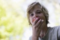 Closeup Of Boy Eating Apple Outdoors Royalty Free Stock Photo