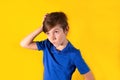 Closeup boy emotion thinks. 9 years old boy reflects on a new idea. Promo action Royalty Free Stock Photo