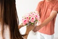 giving rose flower bouquet in valentine day Royalty Free Stock Photo