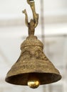 Closeup of Brass bell hung in front of deity in Hindu temple Royalty Free Stock Photo