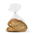 Closeup bread loaf in plastic bag isolated on white background