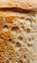 A closeup of the bread texture, showcasing its soft and airy surface with visible bubbles and subtle variations in its Royalty Free Stock Photo