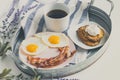 Closeup of the breakfast platter with healthy ingredients such as eggs with a cup of coffee Royalty Free Stock Photo