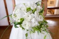 Closeup bride holding bouquet of white roses Royalty Free Stock Photo