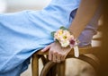 Closeup of bridesmaid wearing a corsage Royalty Free Stock Photo