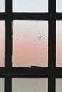 Closeup of a broken window of opaque glass Royalty Free Stock Photo