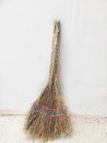 broom against wall