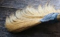 Closeup of broom on wooden