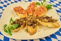 Closeup of Bruschettas with Mushrooms Plate