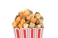 Closeup bucket of halloween black licorice and orange popcorn