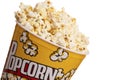 Closeup of a bucket of popcorn on white background Royalty Free Stock Photo