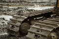 closeup of bulldozer tracks in muddy terrain Royalty Free Stock Photo