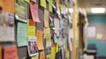 A closeup of a bulletin board in the common room filled with flyers and adver for upcoming guest speaker events and