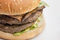 Closeup of burger on white