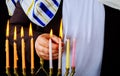Closeup of a burning Chanukah candlestick with candles Menorah Royalty Free Stock Photo