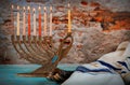 Closeup of a burning Chanukah candlestick with candles Menorah Royalty Free Stock Photo