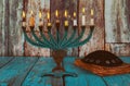 Closeup of a burning Chanukah candlestick with candles Menorah