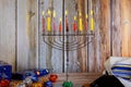 Closeup of a burning Chanukah candlestick with candles Menorah Royalty Free Stock Photo