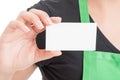 Closeup of business card in hypermarket employee hand Royalty Free Stock Photo