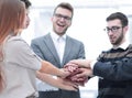 Business colleagues with their hands stacked together Royalty Free Stock Photo