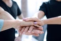 Closeup of a business colleagues with their hands stacked together Royalty Free Stock Photo