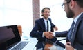 Closeup. business handshake in an office. Royalty Free Stock Photo