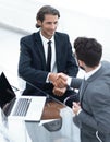 Closeup. business handshake in an office. Royalty Free Stock Photo