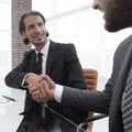 Closeup. business handshake in an office. Royalty Free Stock Photo