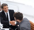 Closeup. business handshake in an office. Royalty Free Stock Photo