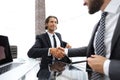 Closeup. business handshake in an office. Royalty Free Stock Photo