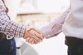 business man with luggage travel hand shake between two colleagues greet Royalty Free Stock Photo