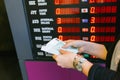 Closeup of business woman with counting money. Woman hands counting euro banknotes against the background of a currency exchange Royalty Free Stock Photo