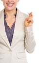 Closeup on business woman with crossed fingers Royalty Free Stock Photo