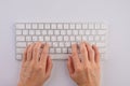 Closeup of business woman hand typing on laptop keyboard with mouse Royalty Free Stock Photo