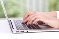 Closeup of business woman hand typing on laptop keyboard Royalty Free Stock Photo